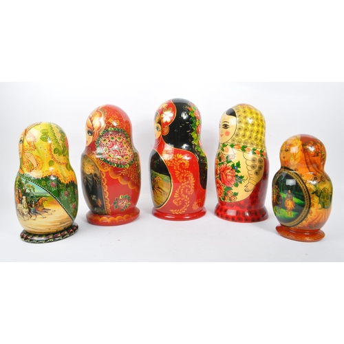 202 - A collection of late 20th century and later Russian USSR folk art Matryoshka graduating nest of doll... 