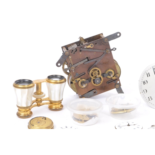 204 - Horology interest - A collection of clock parts to include clock faces, clock movement pieces and me... 