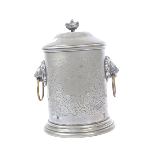 207 - An Anglo-Indian plated circular pewter lidded tea caddy with engraved flourishes and floral pattern,... 