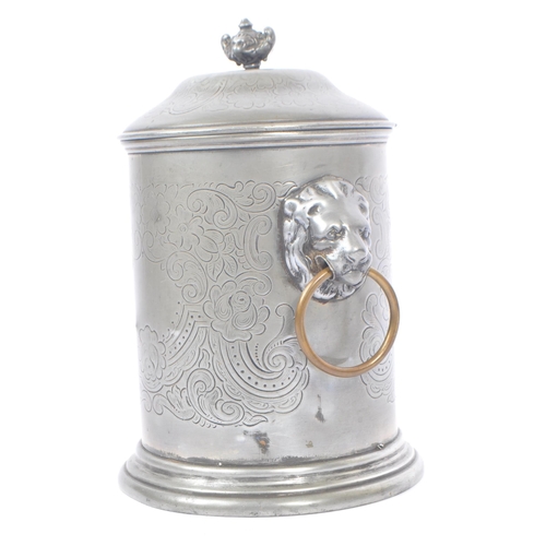 207 - An Anglo-Indian plated circular pewter lidded tea caddy with engraved flourishes and floral pattern,... 