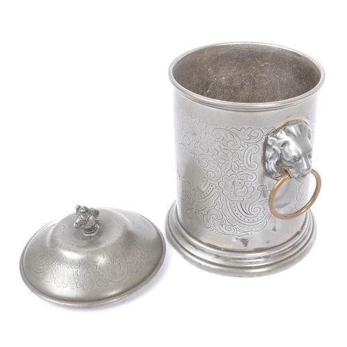 207 - An Anglo-Indian plated circular pewter lidded tea caddy with engraved flourishes and floral pattern,... 