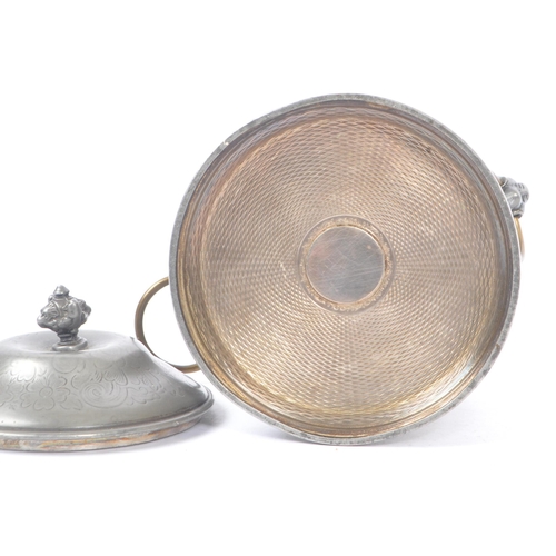 207 - An Anglo-Indian plated circular pewter lidded tea caddy with engraved flourishes and floral pattern,... 