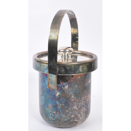 209 - A late 20th century Italian white metal silver plate ice bucket. Having an arched carry handle with ... 