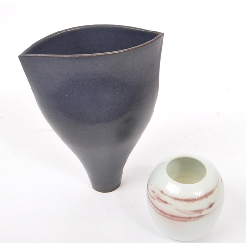 21 - Laurence Rye - A 20th Century studio pottery vase by Laurence Rye, dark blue ground of tapered asymm... 