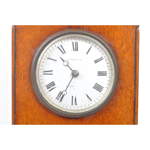 210 - An early 20th century oak mantel clock barometer. The clock sat on a plinth base, stepped to top, be... 