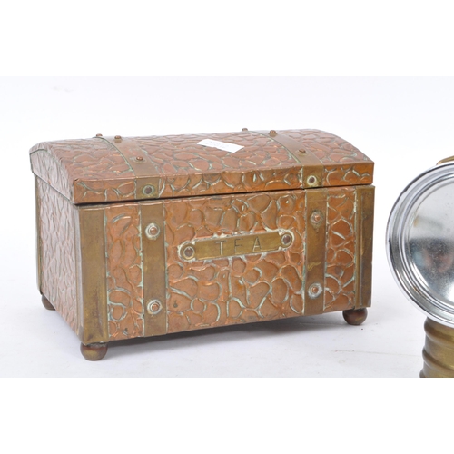 215 - A collection of 20th century brass decorative curios. The collection to include a Pyrene brass fire ... 