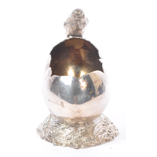 217 - A 20th Century 1930s Art Deco silver plate salt cellar in the form of a chick and large cracked egg,... 