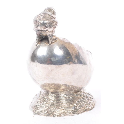 217 - A 20th Century 1930s Art Deco silver plate salt cellar in the form of a chick and large cracked egg,... 