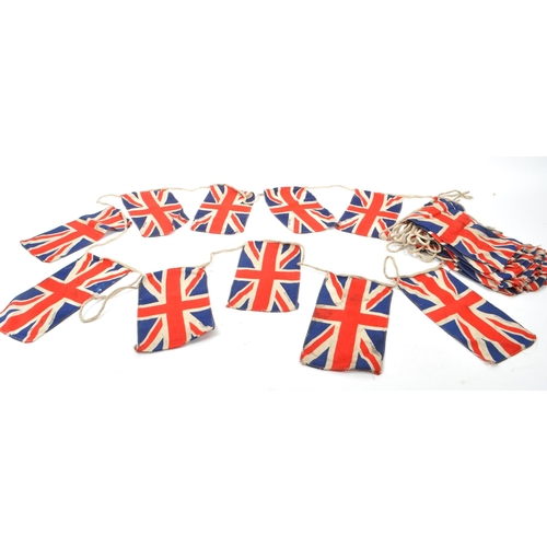 226 - A string of 20th century circa 1940s British Union Jack flag bunting. Each piece in small lettering ... 