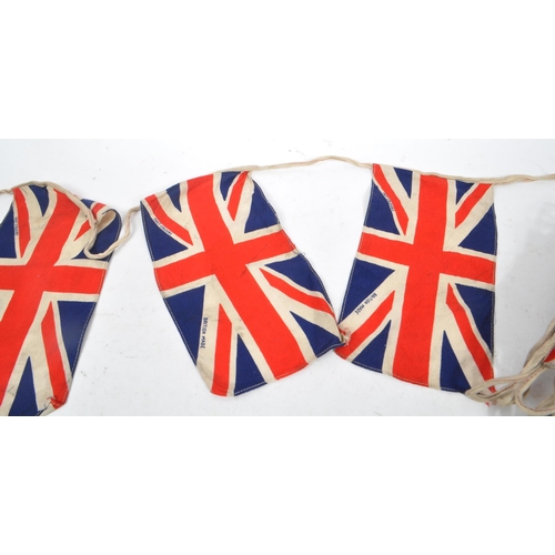 226 - A string of 20th century circa 1940s British Union Jack flag bunting. Each piece in small lettering ... 