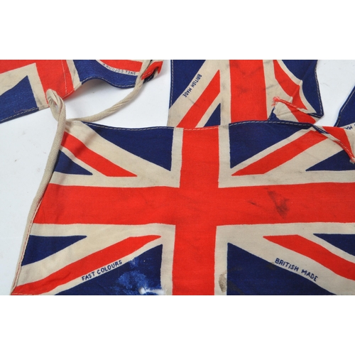 226 - A string of 20th century circa 1940s British Union Jack flag bunting. Each piece in small lettering ... 