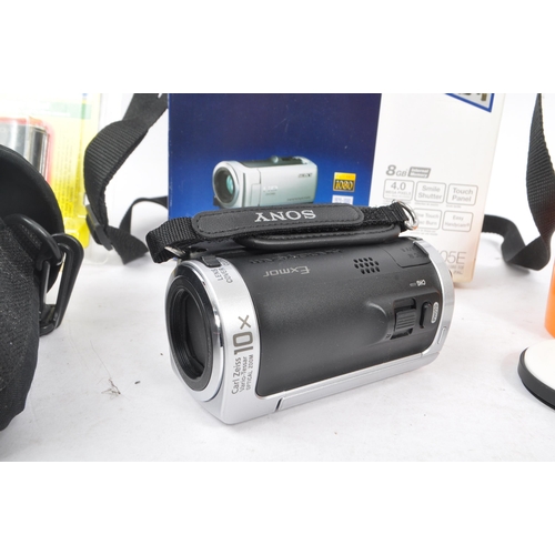 231 - Sony - An early 2000s circa 2009 Sony Handycam HDR-CX105E handheld digital camcorder. The camcorder ... 