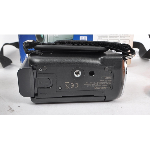 231 - Sony - An early 2000s circa 2009 Sony Handycam HDR-CX105E handheld digital camcorder. The camcorder ... 