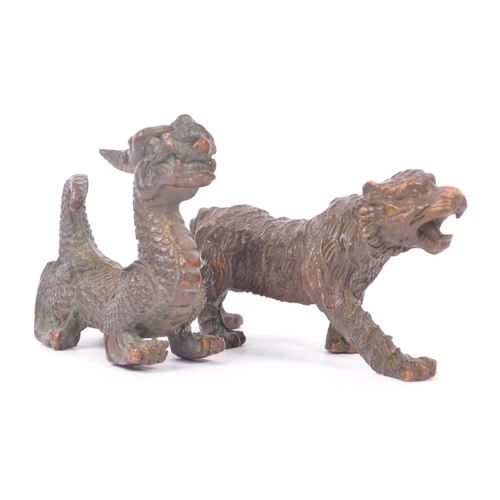 232 - Two Chinese bronze sculptures / figures. Comprising of a mythical Chinese dragon together with a wil... 