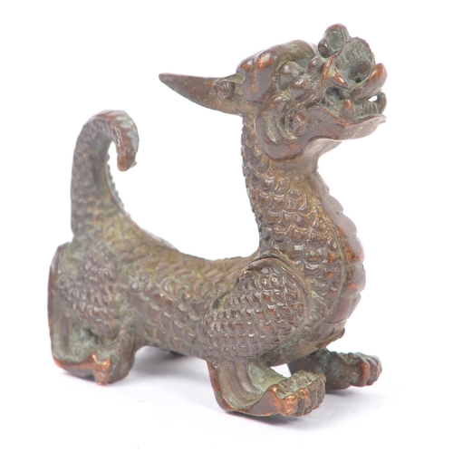 232 - Two Chinese bronze sculptures / figures. Comprising of a mythical Chinese dragon together with a wil... 