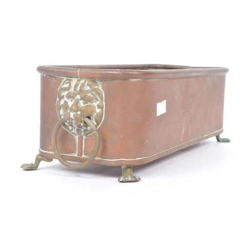 236 - A 19th Century Victorian copper trough / planter of rectangular form with brass lions head ring hand... 