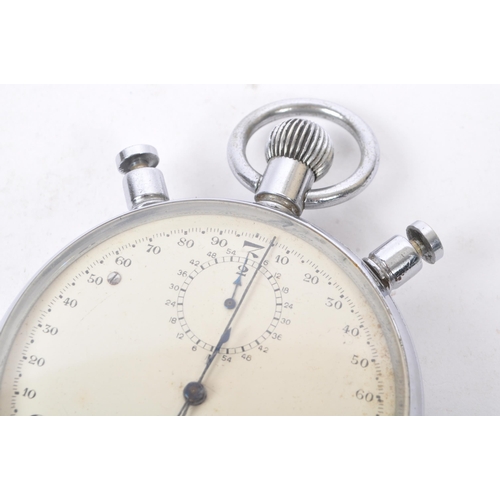 238 - A 20th Century Nero Lemania stopwatch / clock with engraved writing to back 'Proprieta Di Lamborghin... 