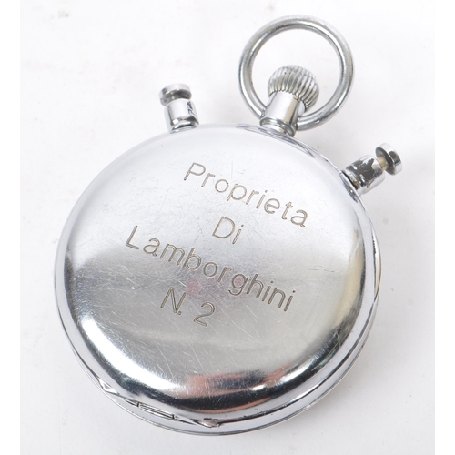 238 - A 20th Century Nero Lemania stopwatch / clock with engraved writing to back 'Proprieta Di Lamborghin... 