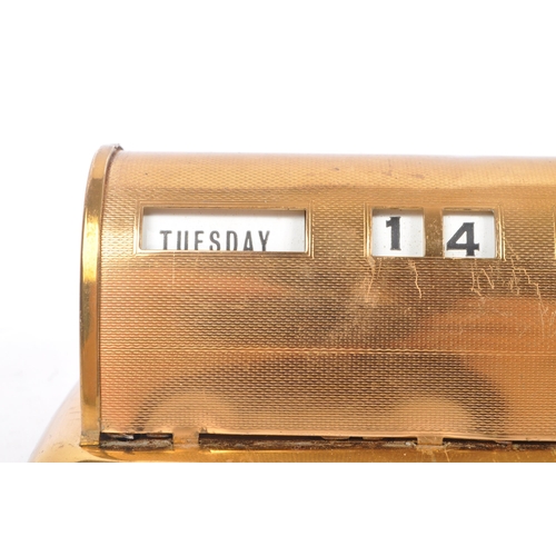 239 - A mid Century circa 1940s brass Stratton desktop perpetual calendar. The calendar raised on stepped ... 