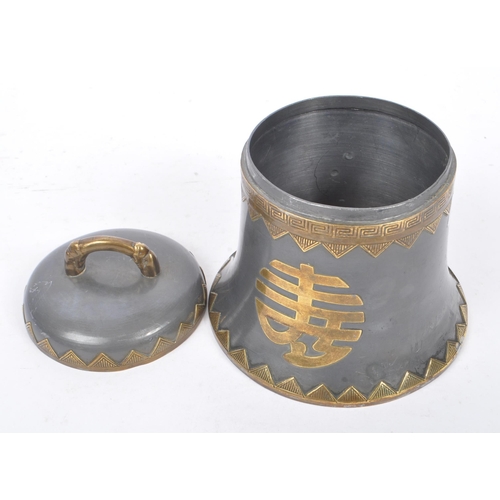 240 - An early 20th century 1920s pewter lidded tea caddy in the form of a bell with chinese characters de... 