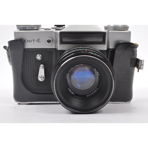 241 - Zenit - A mid 20th century circa 1960s Zenit E 35mm SLR camera. The camera having a silver metal bod... 