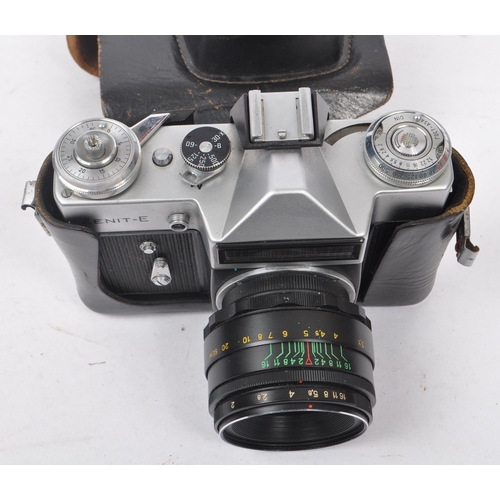 241 - Zenit - A mid 20th century circa 1960s Zenit E 35mm SLR camera. The camera having a silver metal bod... 