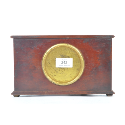 242 - An early 20th century Kemp Brothers, Bristol mahogany mantel clock. The clock featuring a gilt guill... 