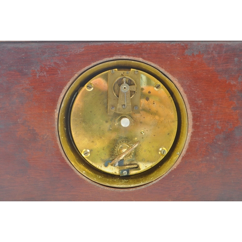 242 - An early 20th century Kemp Brothers, Bristol mahogany mantel clock. The clock featuring a gilt guill... 