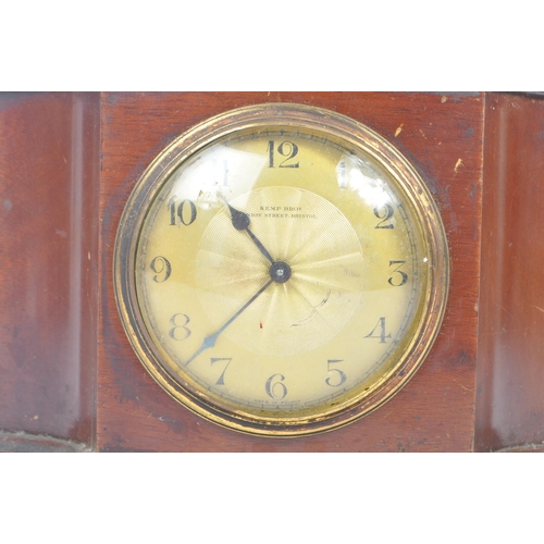 242 - An early 20th century Kemp Brothers, Bristol mahogany mantel clock. The clock featuring a gilt guill... 