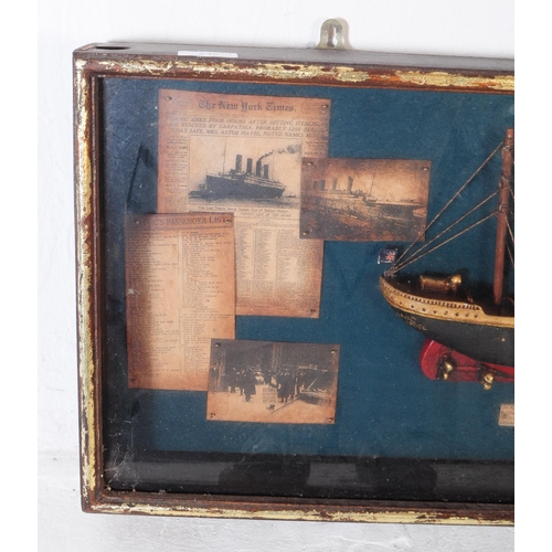 245 - RMS Titanic - A vintage 20th century display box of a wooden construction painted Titanic cruise shi... 