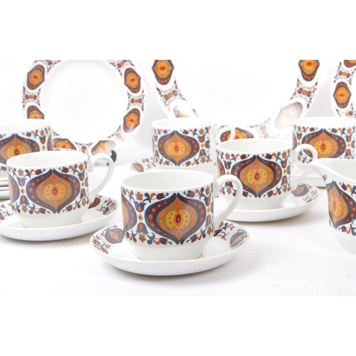 25 - Mid Winter - A retro mid 20th century ceramic tea service set. Including cups ,saucers, sugar pot, m... 