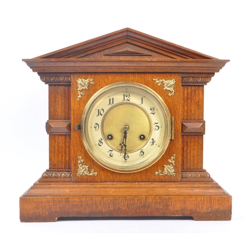 253 - A collection of vintage 20th century mantel clocks. Including two Art Deco style examples, with carr... 