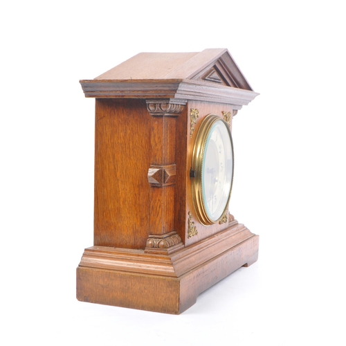 253 - A collection of vintage 20th century mantel clocks. Including two Art Deco style examples, with carr... 