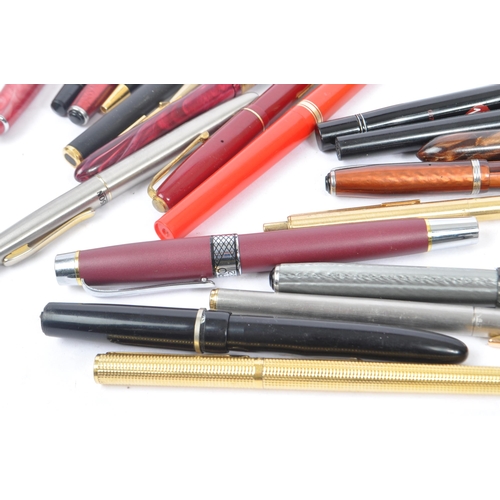 254 - A large collection of 20th century ballpoint and fountain pens. The collection to include examples f... 