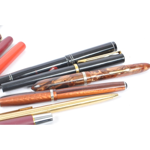 254 - A large collection of 20th century ballpoint and fountain pens. The collection to include examples f... 