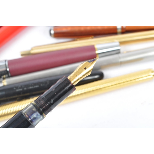 254 - A large collection of 20th century ballpoint and fountain pens. The collection to include examples f... 