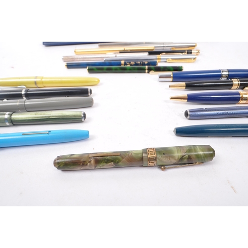 255 - A large collection of 20th century ballpoint and fountain pens. The collection to include examples f... 