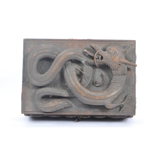 258 - A vintage 20th century Asian oriental Chinese dragon stationary box. With carved relief dragon detai... 