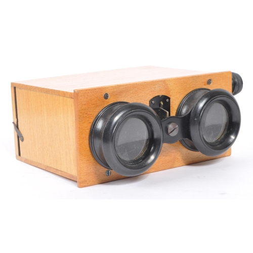 260 - A 20th Century stereoscope / viewer with five boxes of Stereofilms Bruguiere Positifs films depictin... 