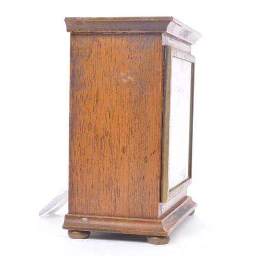 262 - Gerrard & Co. Ltd Elliott London - A 20th Century oak mantle clock of square form with silver face a... 