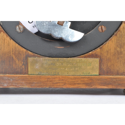 262 - Gerrard & Co. Ltd Elliott London - A 20th Century oak mantle clock of square form with silver face a... 