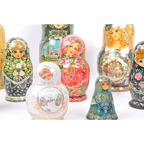 263 - A collection of late 20th century and later Russian USSR folk art Matryoshka graduating nest of doll... 