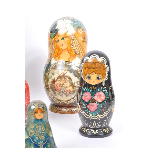 263 - A collection of late 20th century and later Russian USSR folk art Matryoshka graduating nest of doll... 