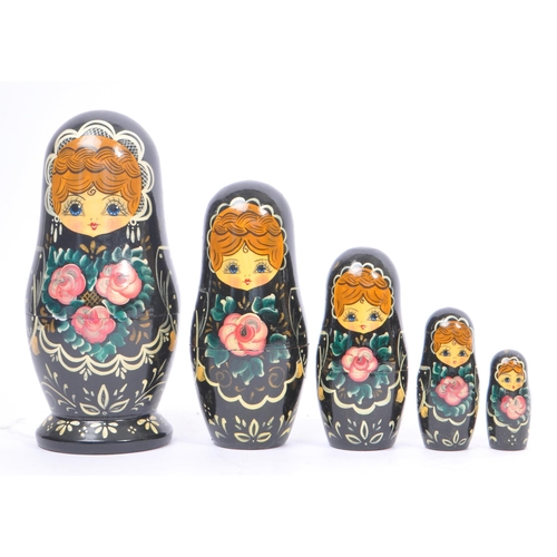 263 - A collection of late 20th century and later Russian USSR folk art Matryoshka graduating nest of doll... 