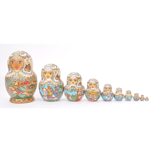 265 - A collection of late 20th century and later Russian USSR folk art Matryoshka graduating nest of doll... 