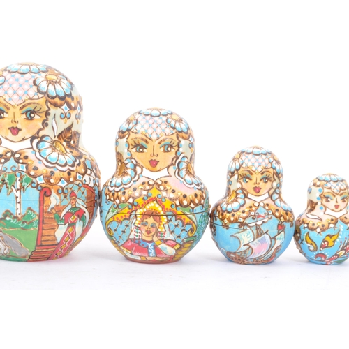 265 - A collection of late 20th century and later Russian USSR folk art Matryoshka graduating nest of doll... 