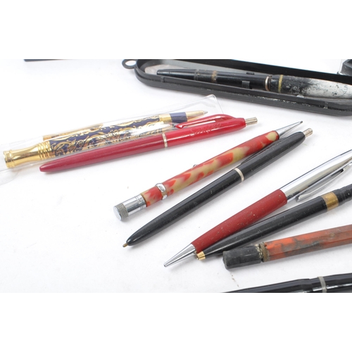 266 - A collection of 20th century pens and pencils. The collection to include examples by Parker, Paperma... 