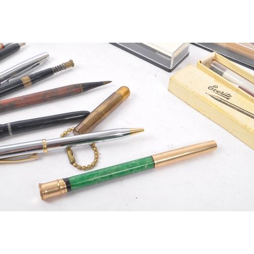 266 - A collection of 20th century pens and pencils. The collection to include examples by Parker, Paperma... 