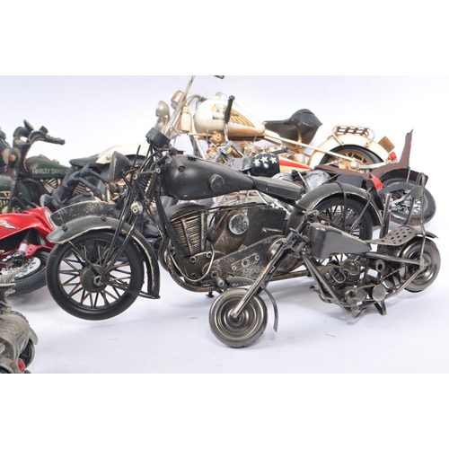 278 - A large collection of assorted novelty motorbike figurines and souvenirs. Various resin and metal ex... 