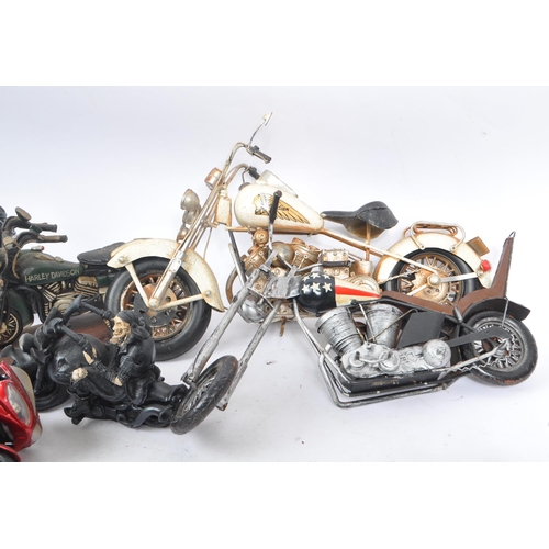 278 - A large collection of assorted novelty motorbike figurines and souvenirs. Various resin and metal ex... 